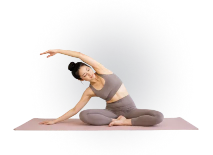 Yoga student in a seated side stretch