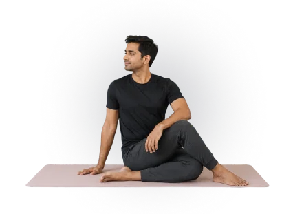 Yoga student seated with legs folded