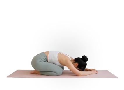 Yoga student in child's pose