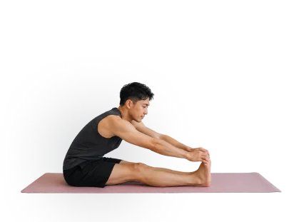 Yoga student in a seated forward fold